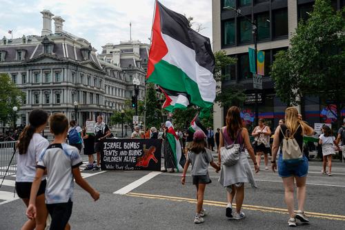 People take part in a protest against Israeli Prime Minister Benjamin Netanyahu near the White House, as Netanyahu meets U.S. President Donald Trump