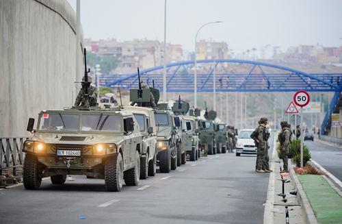 Spanish Soldiers patrol at the Spanish-Moroccan border in Ceuta, Spain, as migrants try to cross the border by the sea, July 31, 2026. REUTERS/Fabian Bimmer
