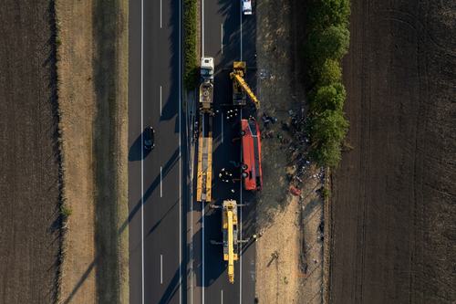 A drone view shows firefighters working on the scene of a deadly accident. MTI/Zoltan Mathe/Pool via REUTERS HUNGARY OUT