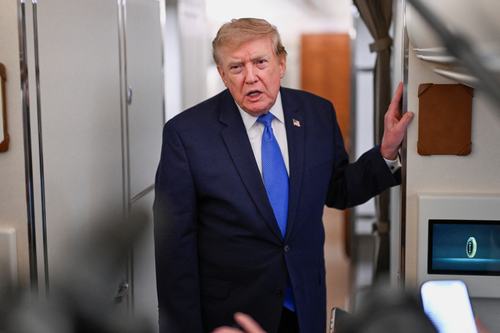 U.S. President Donald Trump speaks to the media aboard Air Force One en route to Joint Base Andrews, in Maryland, U.S., August 2, 2026. REUTERS/Daniel Heuer