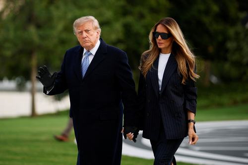 US President Donald Trump and US first lady Melania Trump return to the White House after greeting Chinese President Xi Jinping at Joint Base Andrews,