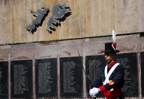 A member of the Granaderos Regiment honour guard stands at the Malvinas memorial, dedicated to those who died in the 1982 war between Britain and Argentina in the Falkland Islands