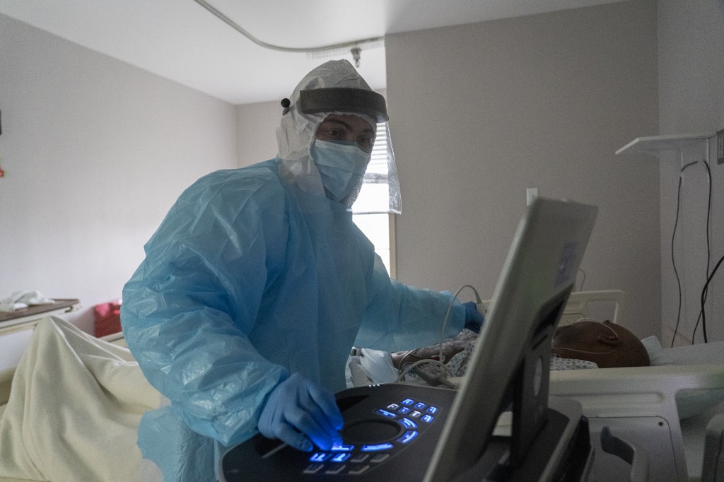 Hospital Workers Cope With Coronavirus Surge In Final Days Of 2020