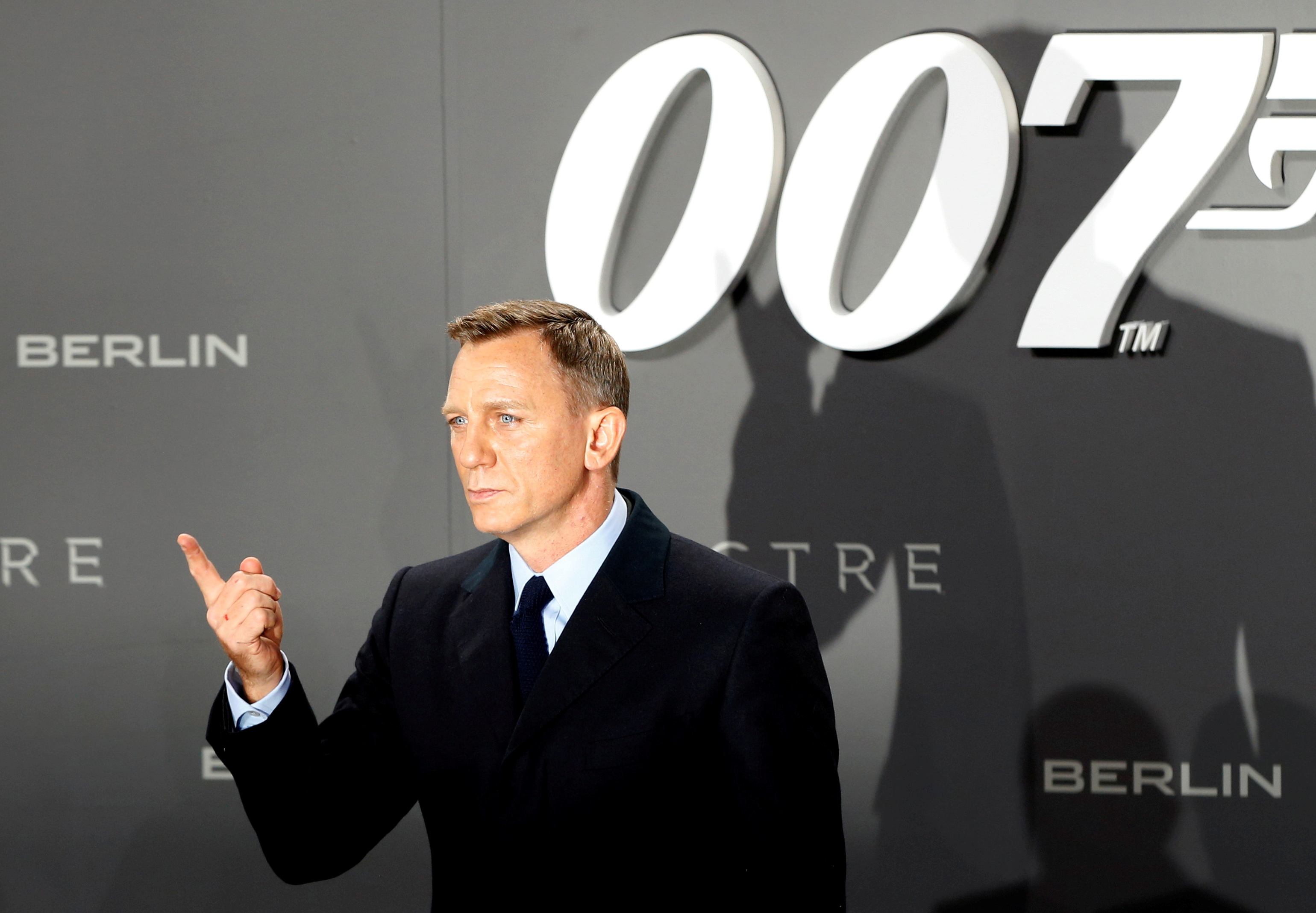 FILE PHOTO: Actor Craig poses for photographers on the red carpet at the German premiere of the new James Bond 007 film "Spectre" in Berlin