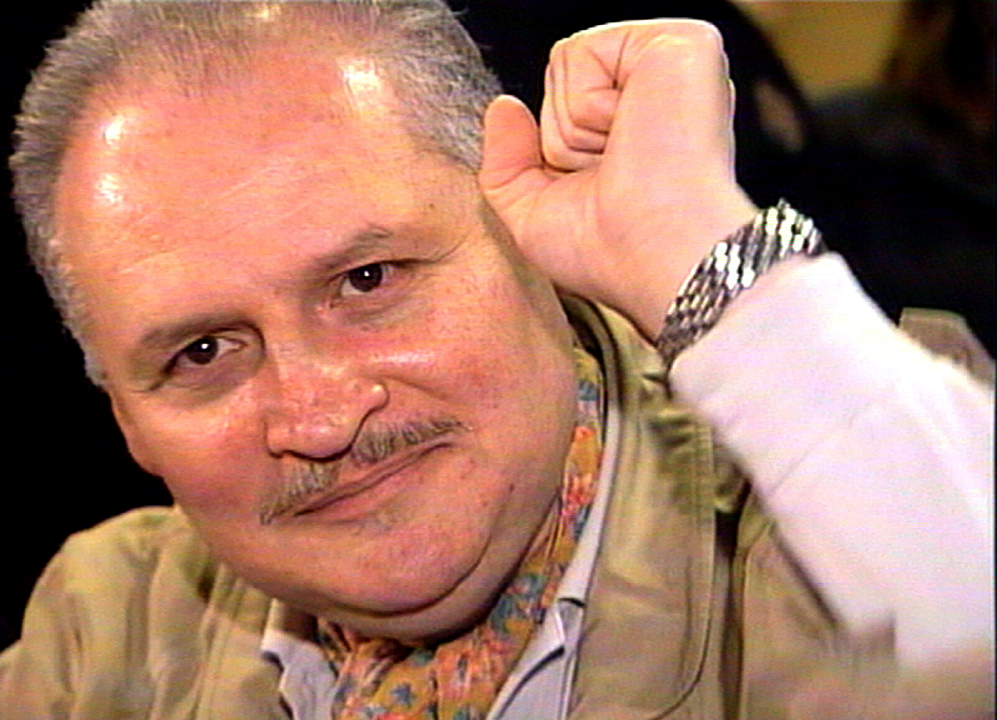 FILE PHOTO: Ilich Ramirez Sanchez, better known as "Carlos the Jackal", raises his fist as he appears in court i..