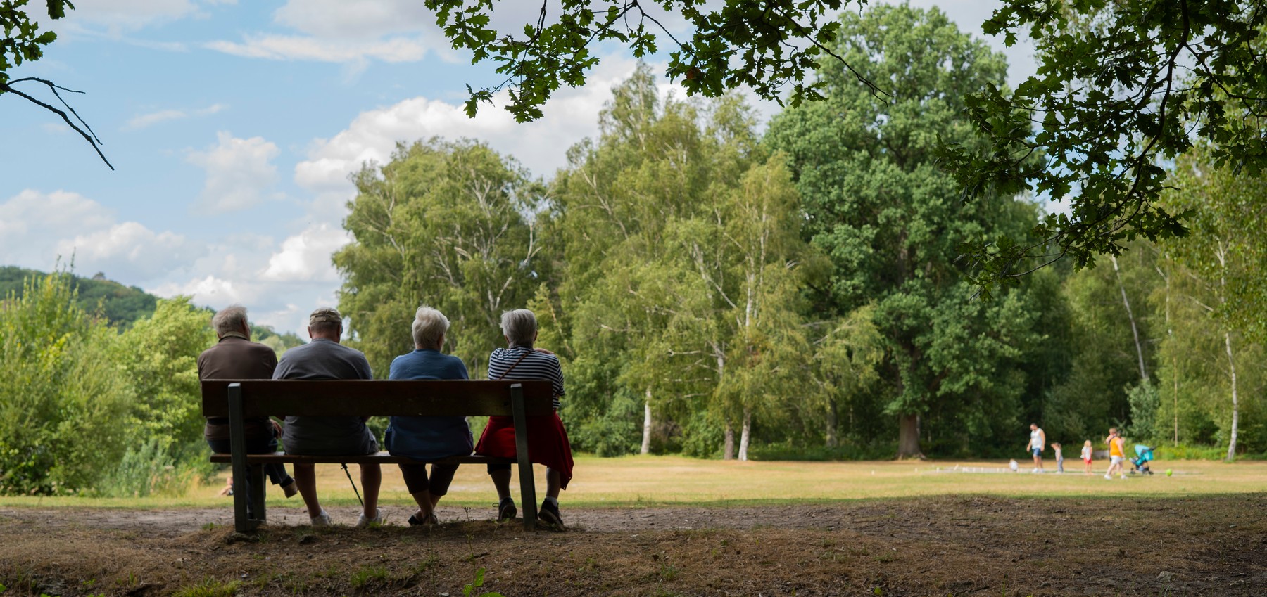 Senior people sitting in park