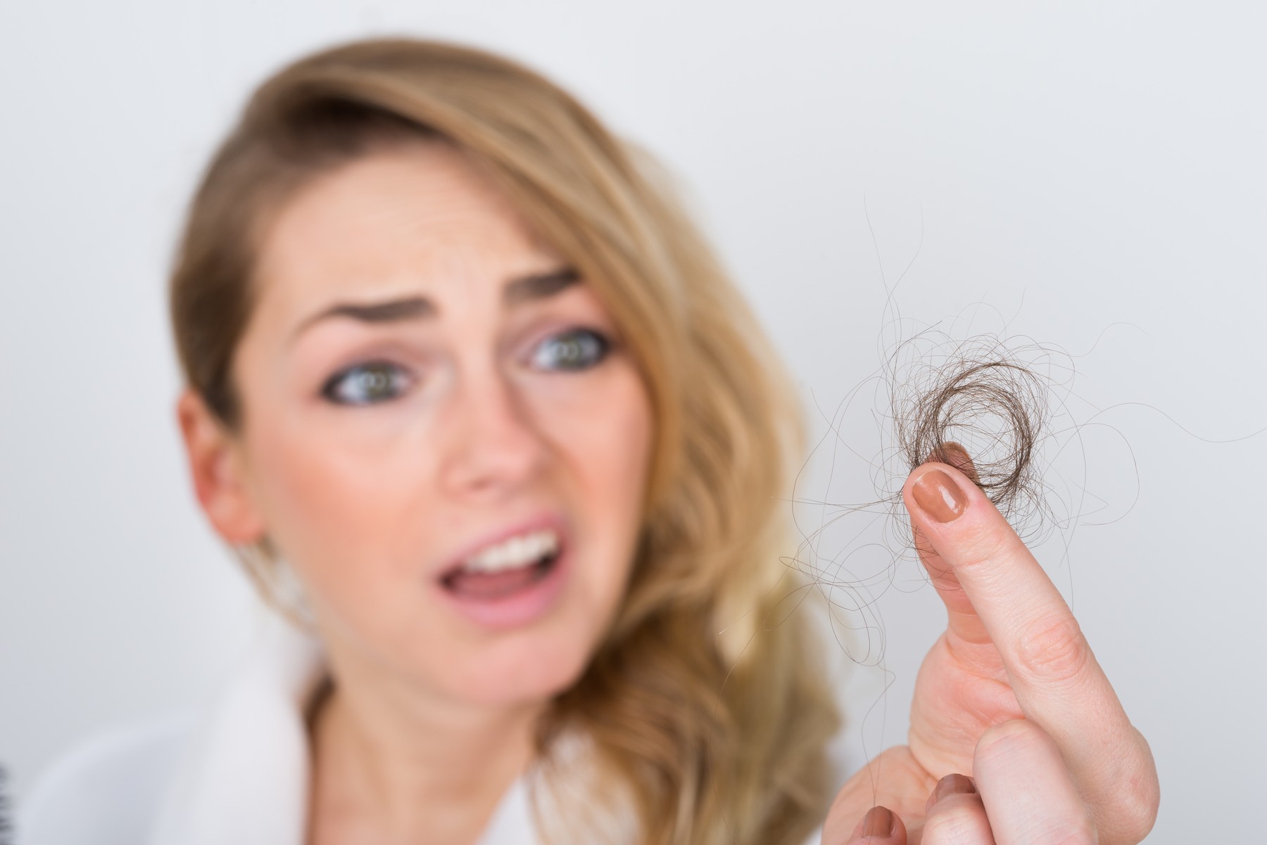 Woman Holding Loss Hair
