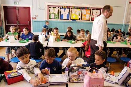 School Dinner Time in the Main Hall Albany Road Primary School Roath Cardiff South Wales