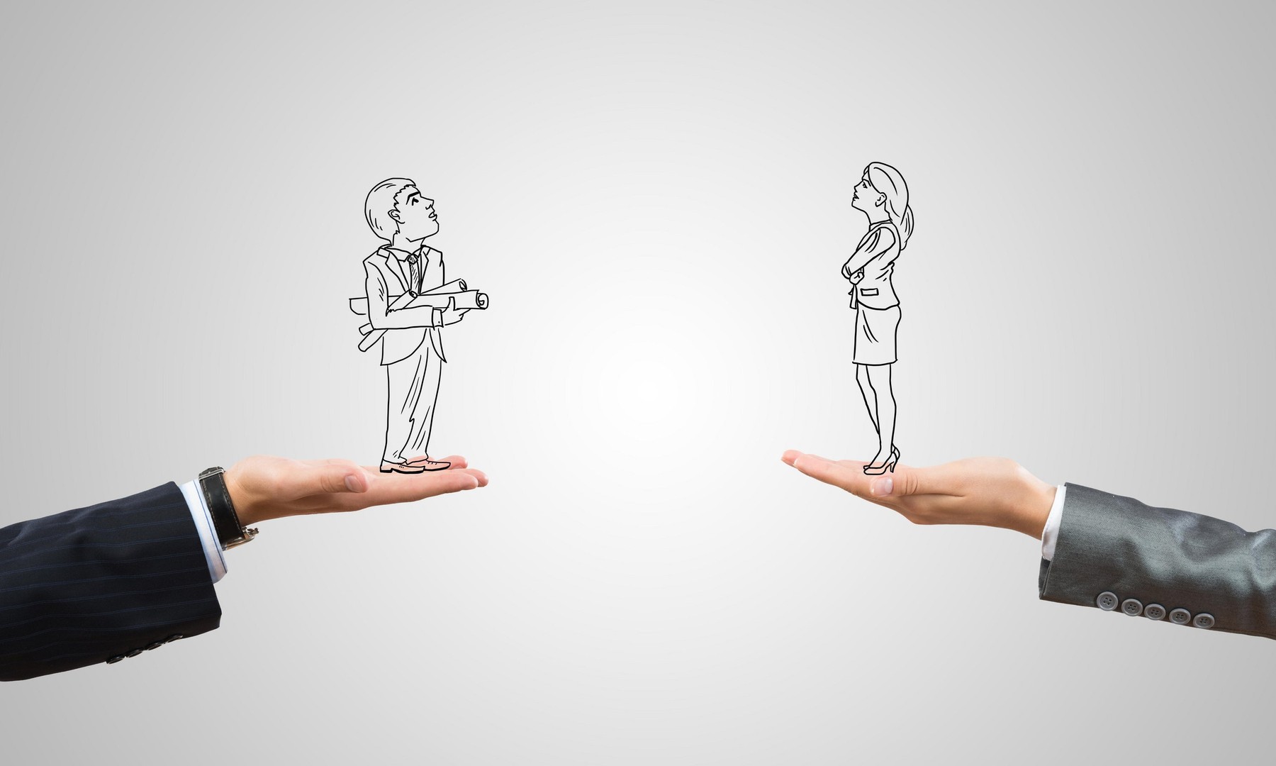 Caricatures of businessman and businesswoman