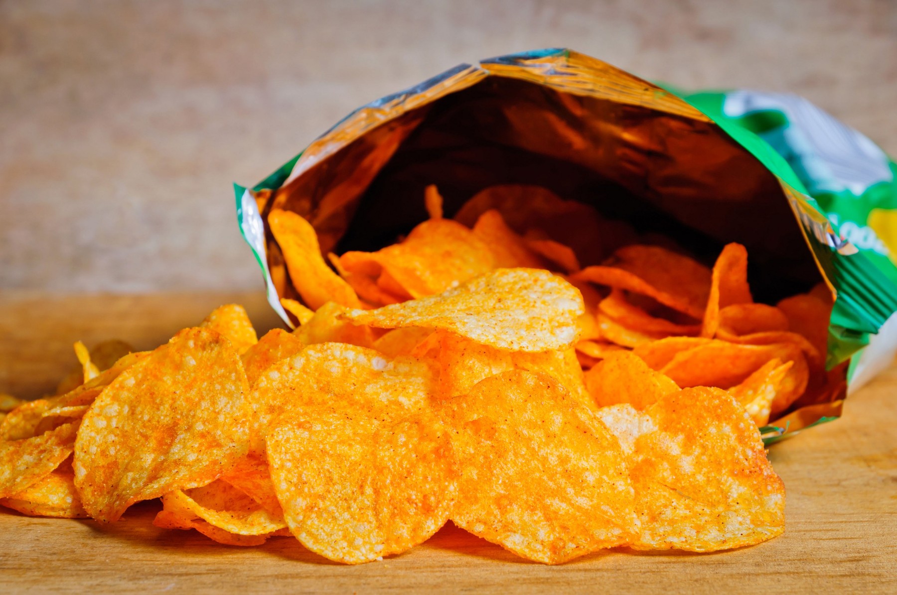 Open bag with potato chips