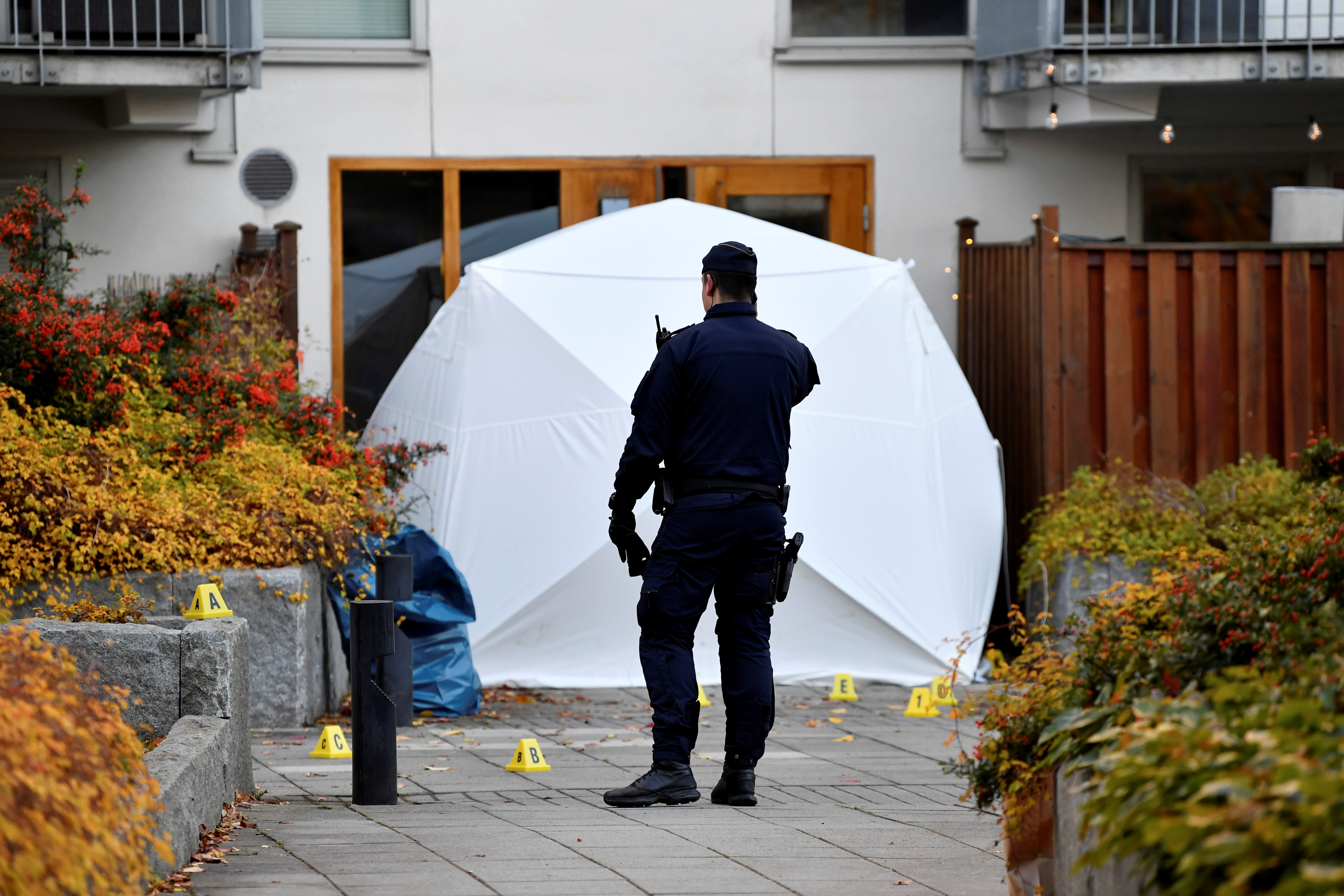 Police forensics work at the site where Swedish rapper Einar was reportedly shot dead, in Stockholm
