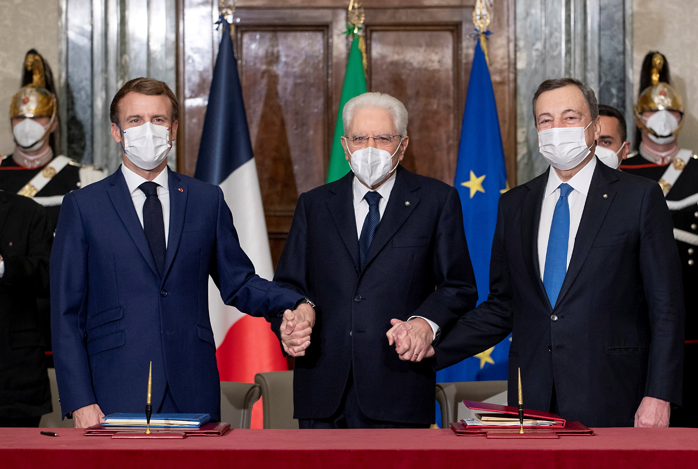 Italian PM Draghi and French President Macron sign a treaty in Rome
