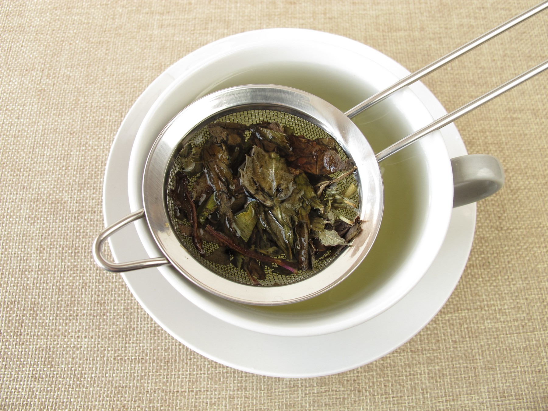 peppermint tea in tea strainer
