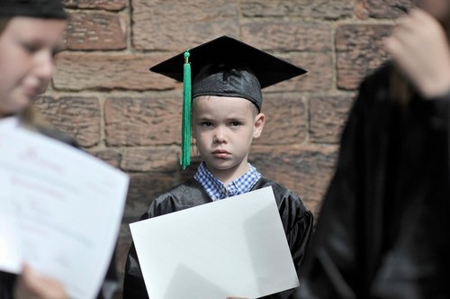 child genius boy university graduate