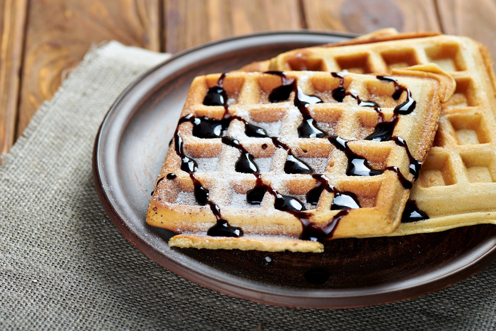 Belgium,Waffles,With,Chocolate,Topping,And,Sugar,Powder.,On,A