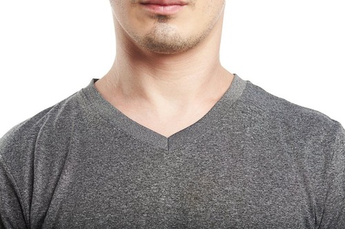 close up of gray v neck t-shirt on mans isolated on white