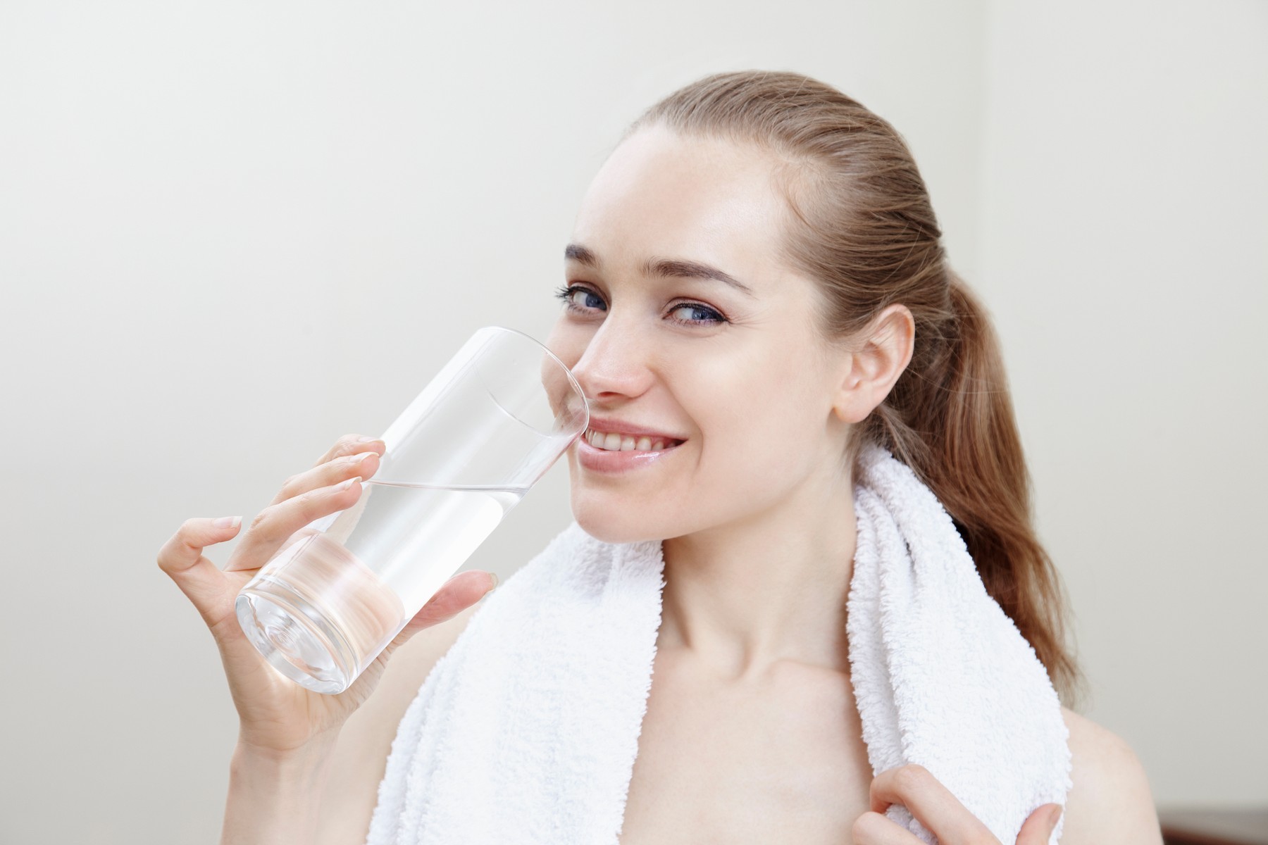 Woman drinking glass of water