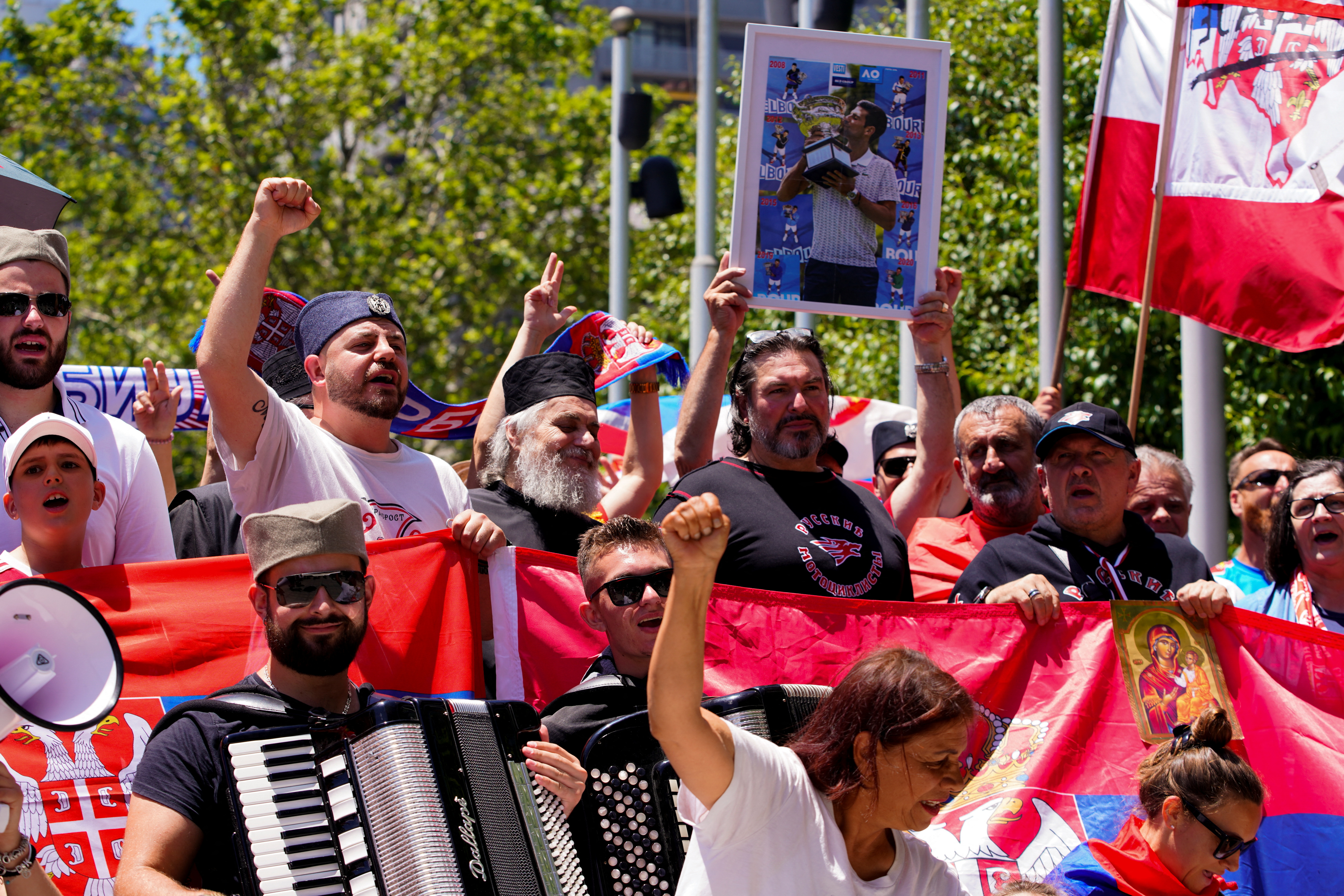 đoković, Supporters of Serbian tennis player Novak Djokovic rally outside the Federal Court of Australia