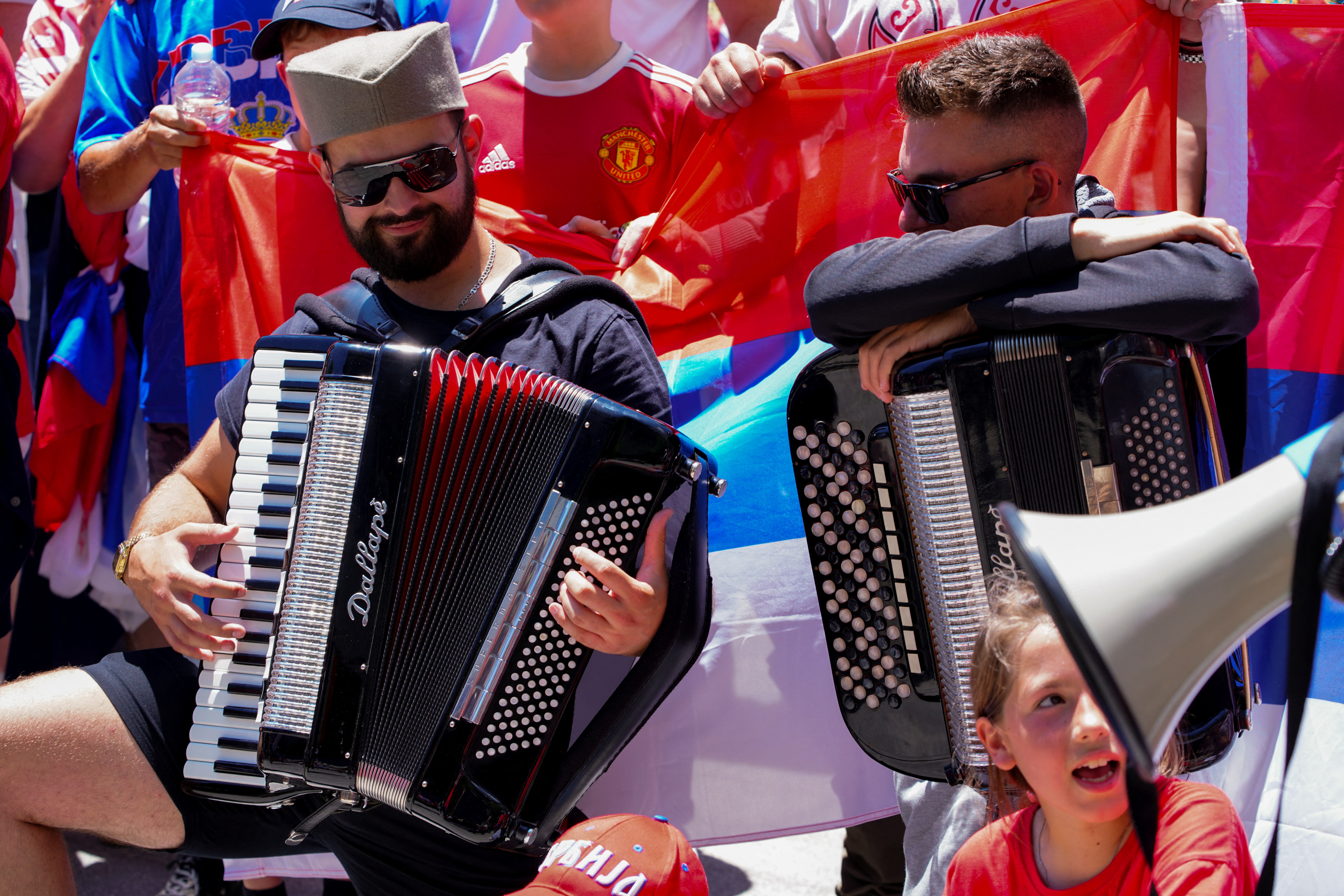 đoković, Supporters of Serbian tennis player Novak Djokovic rally outside the Federal Court of Australia