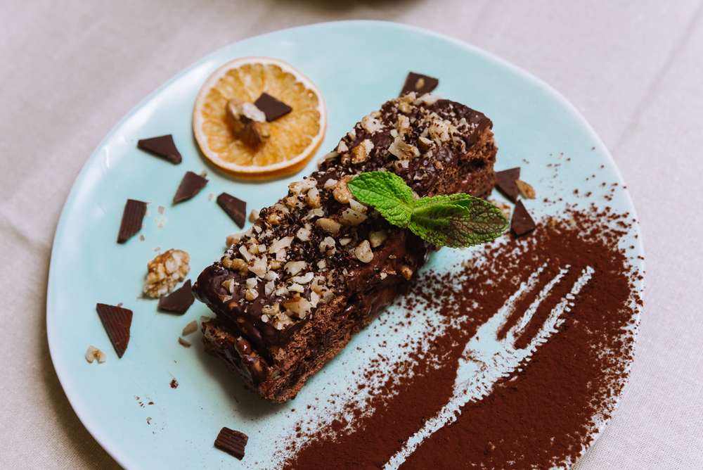 Chocolate,Honey,Biscuit,Cake,With,Sour,And,Butter,Cream,And