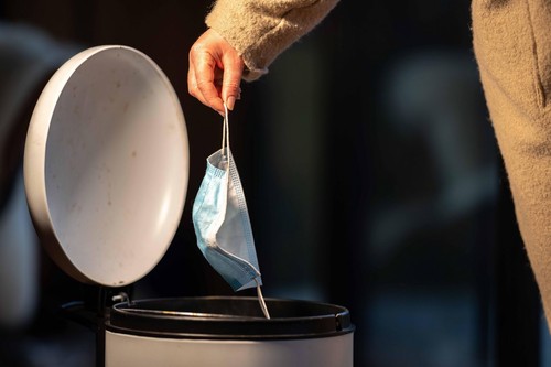 mask in bin, rubbish, garbage and trash. Littering a safety mask in Australia