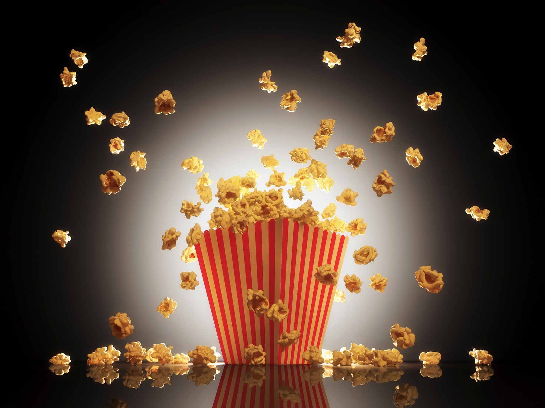 Popcorn exploding from bucket