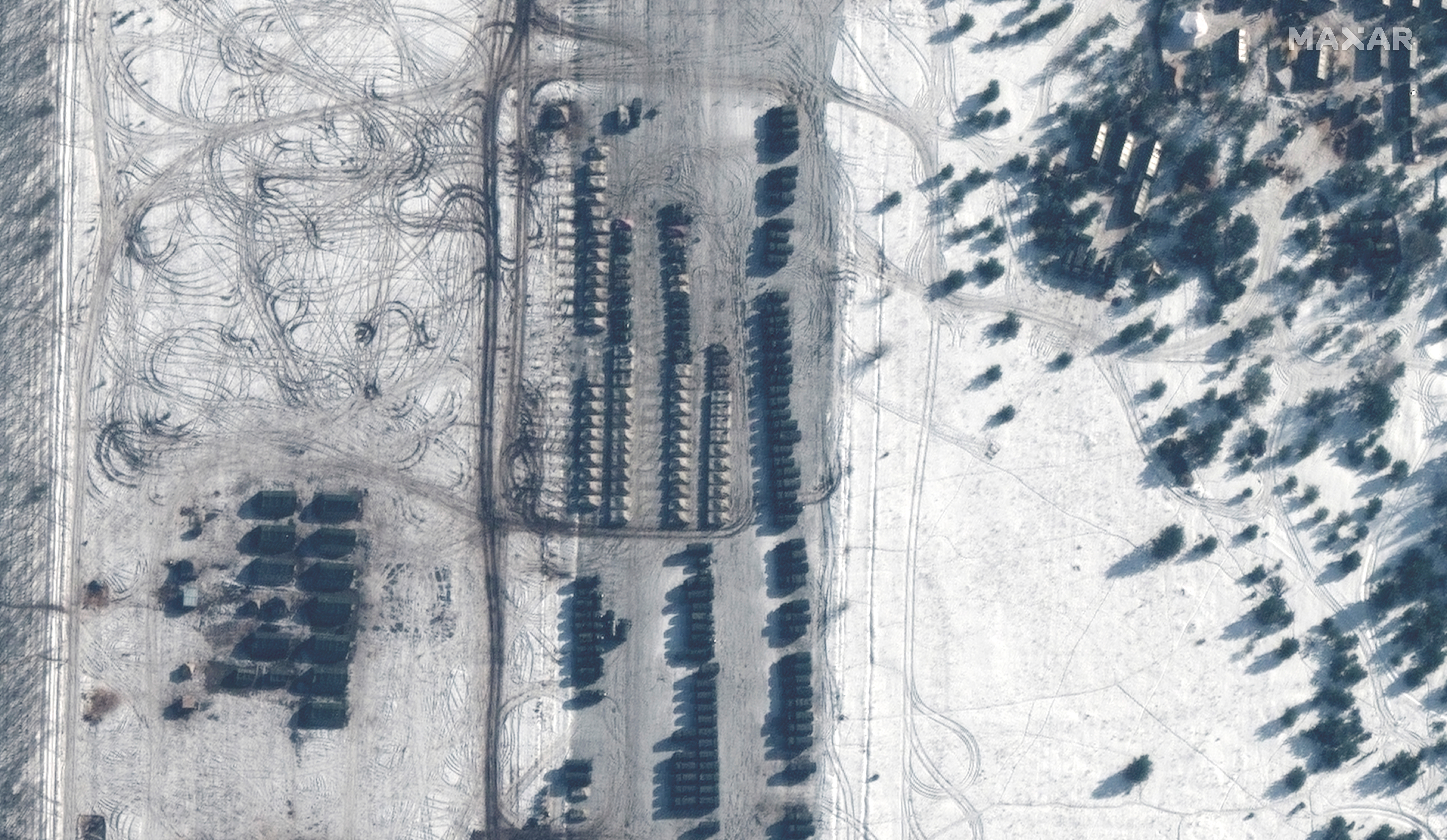 A satellite image shows armoured vehicles at Zyabrovka air base