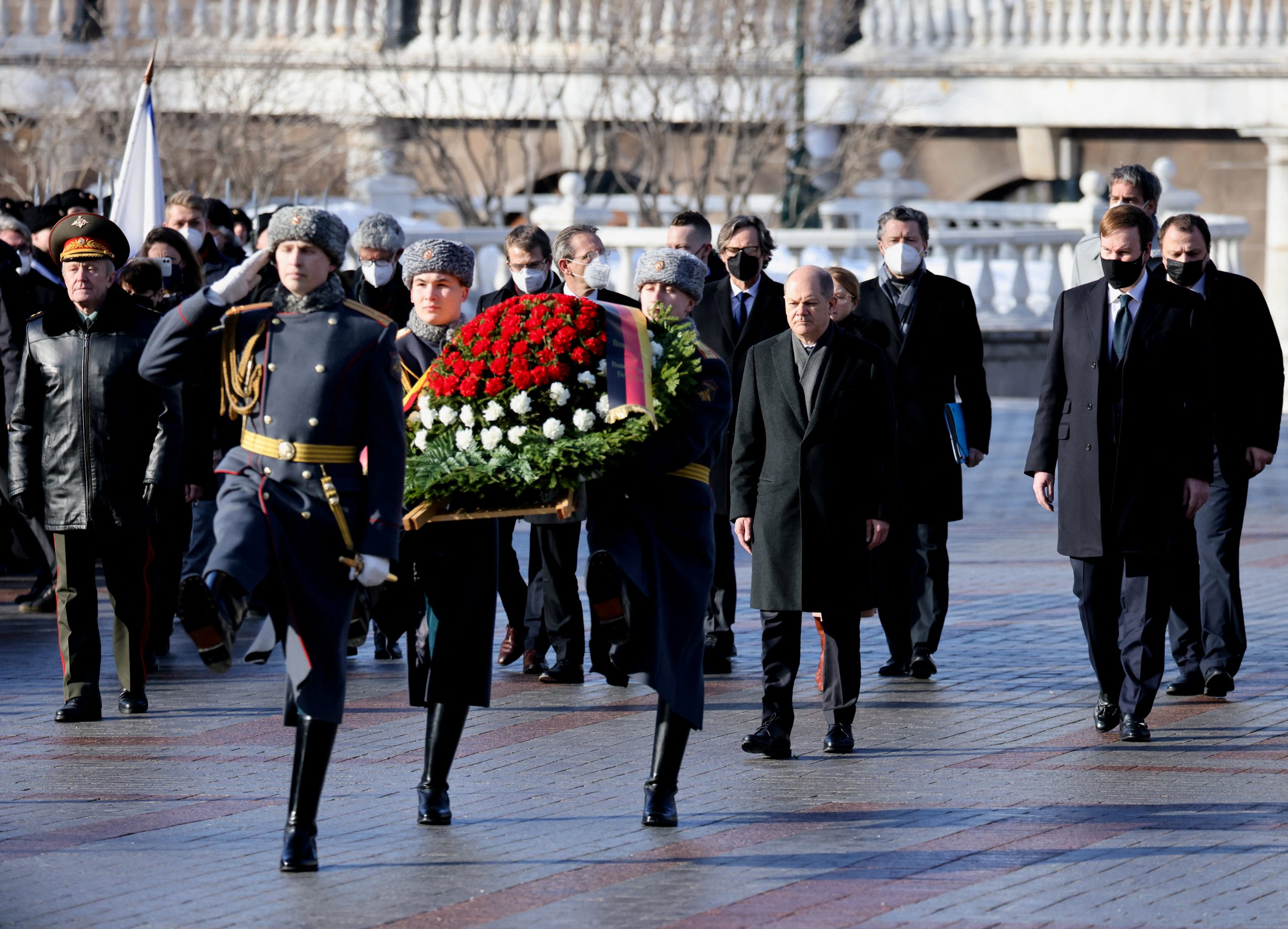 1644920284-2022-02-15T093655Z_1656540938_RC29KS9S5TBD_RTRMADP_3_UKRAINE-CRISIS-SCHOLZ-WREATH-LAYING-scaled.jpg