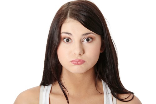 Young woman with hiccup