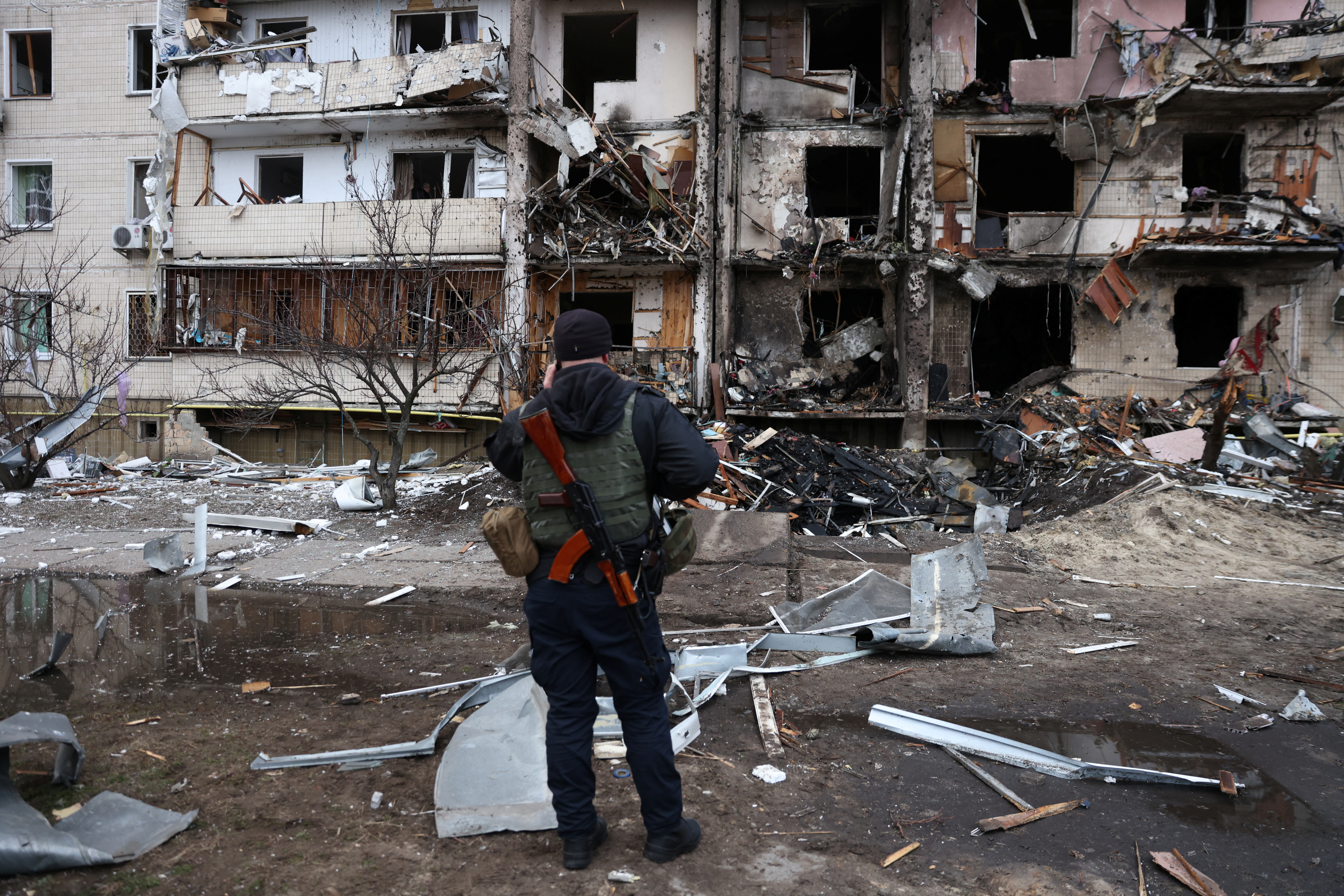 A residential building is damaged, after Russia launched a massive military operation against Ukraine, in Kyiv