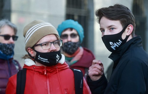MOSCOW, RUSSIA - FEBRUARY 28, 2022: Memorial Society supporters are seen outside the Supreme Court of Russia which is reviewing the legality of its ruling to shut down the Memorial Society, a non-profit international public organisation declared as a fore