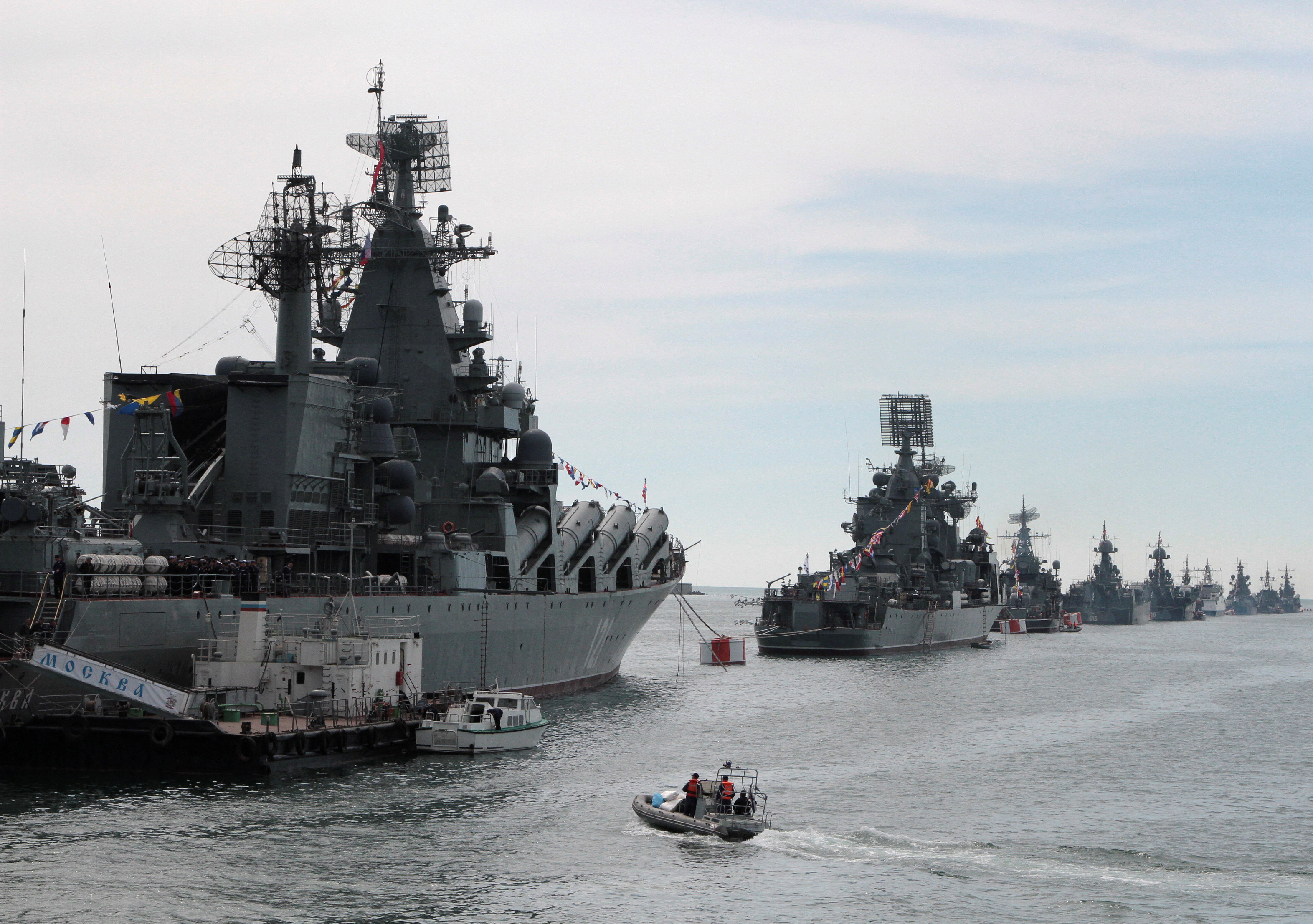FILE PHOTO: Russian Navy vessels are anchored in a bay of the Black Sea port of Sevastopol