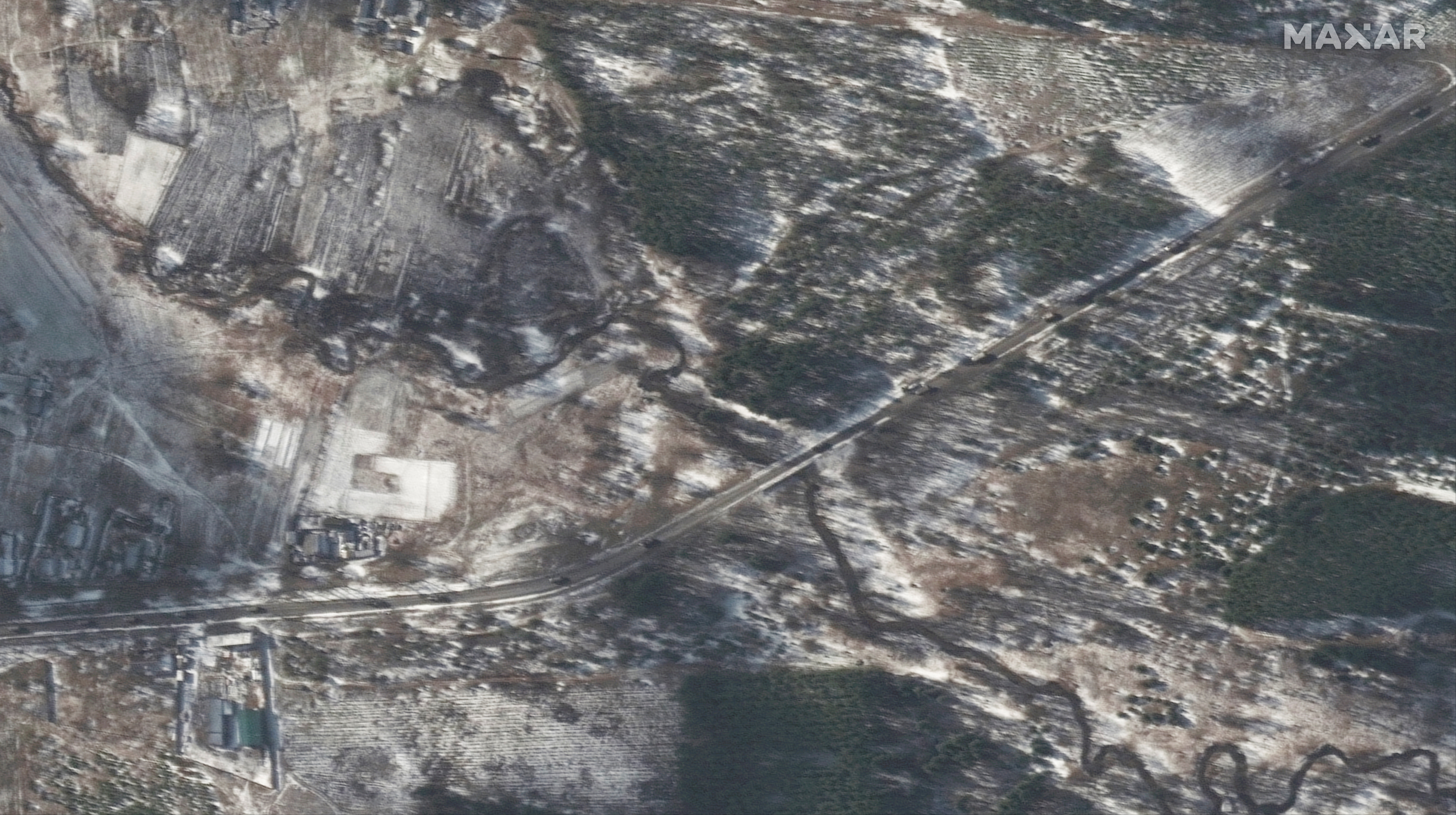 A satellite image shows trucks and equipment in convoy in the southeast of Ivankiv