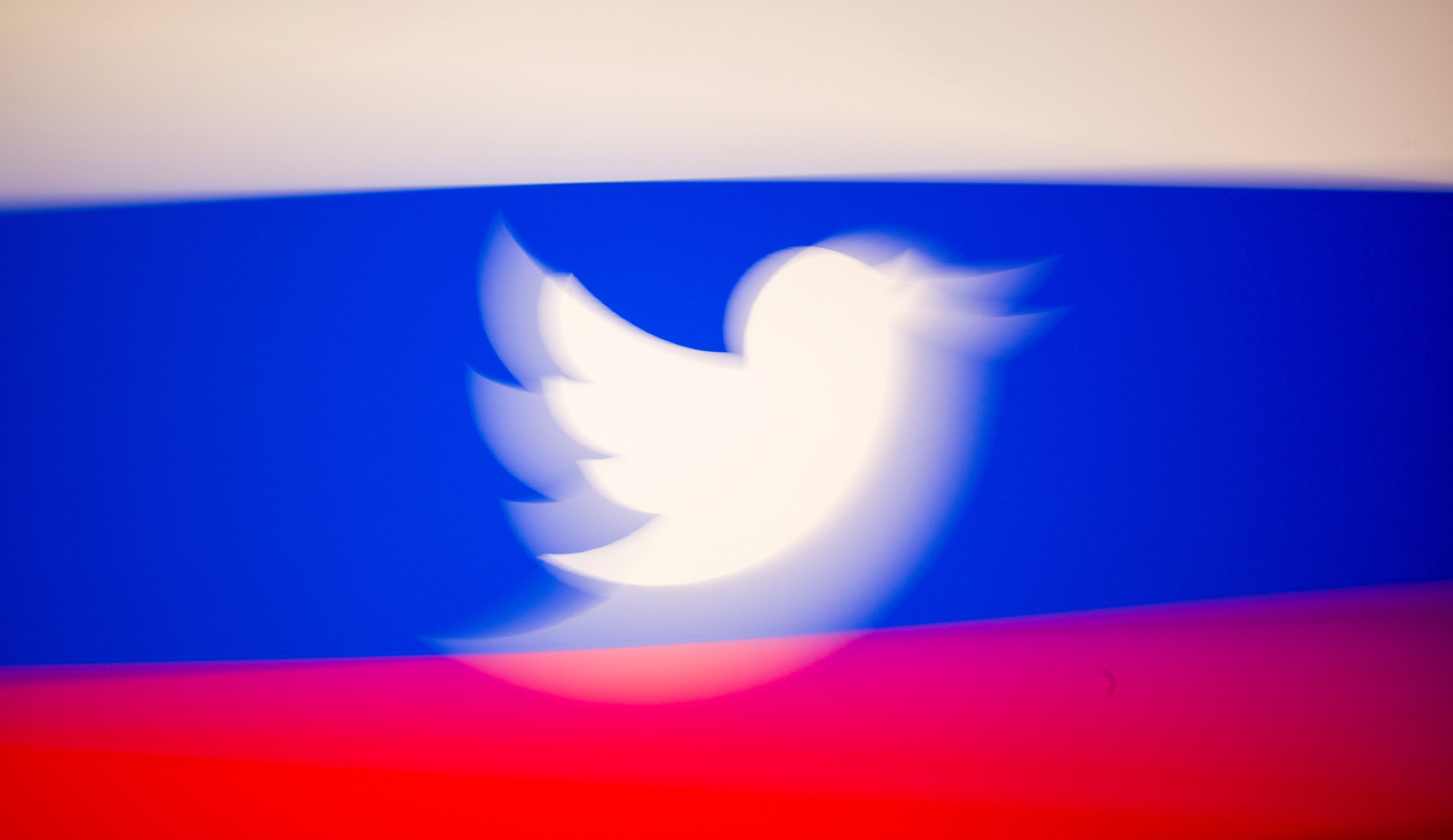 FILE PHOTO: Twitter logo and a Russian flag are displayed in this illustration picture