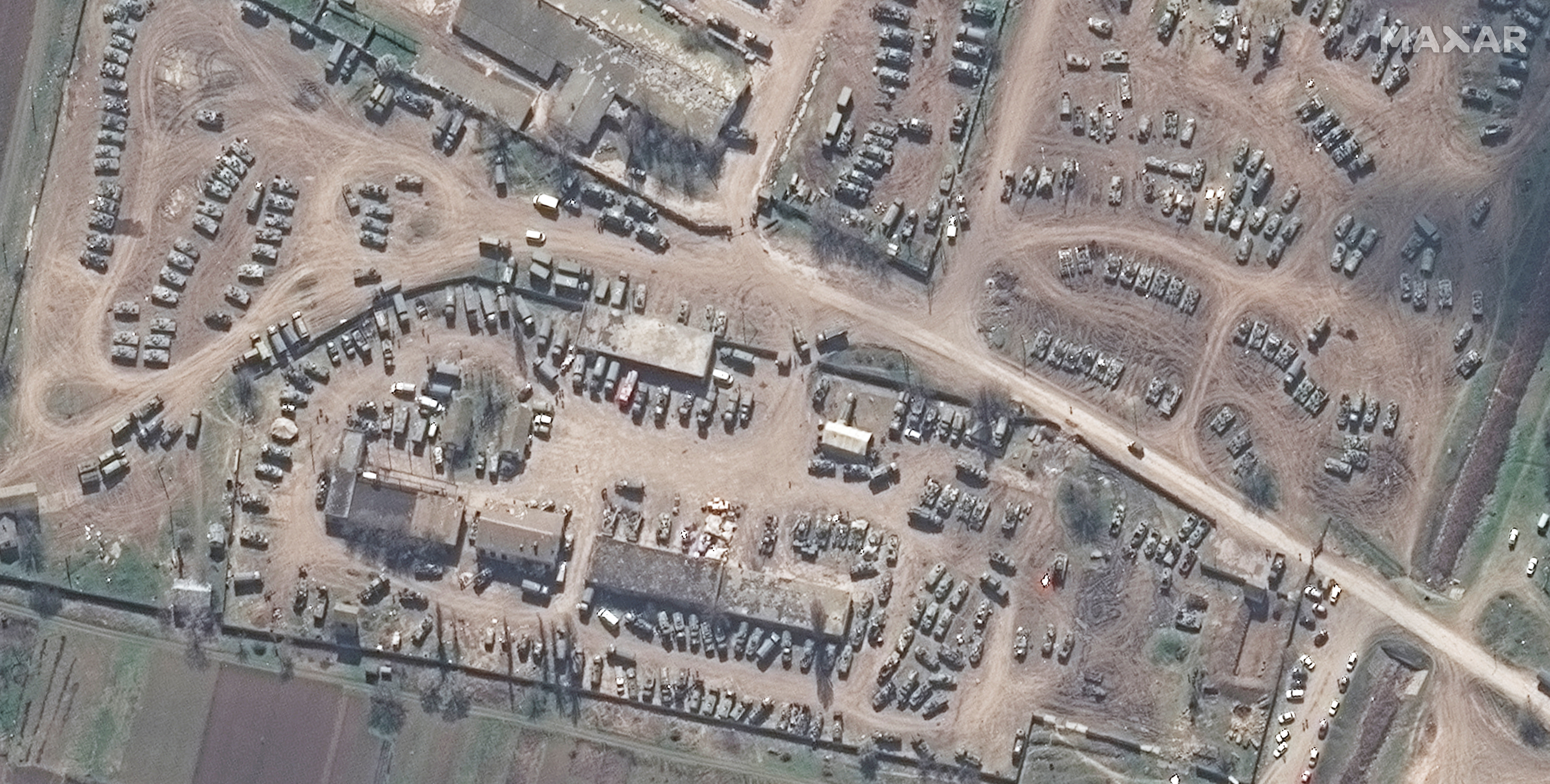 A satellite image shows a closer view of assortment of armored vehicle in Dzhankoy