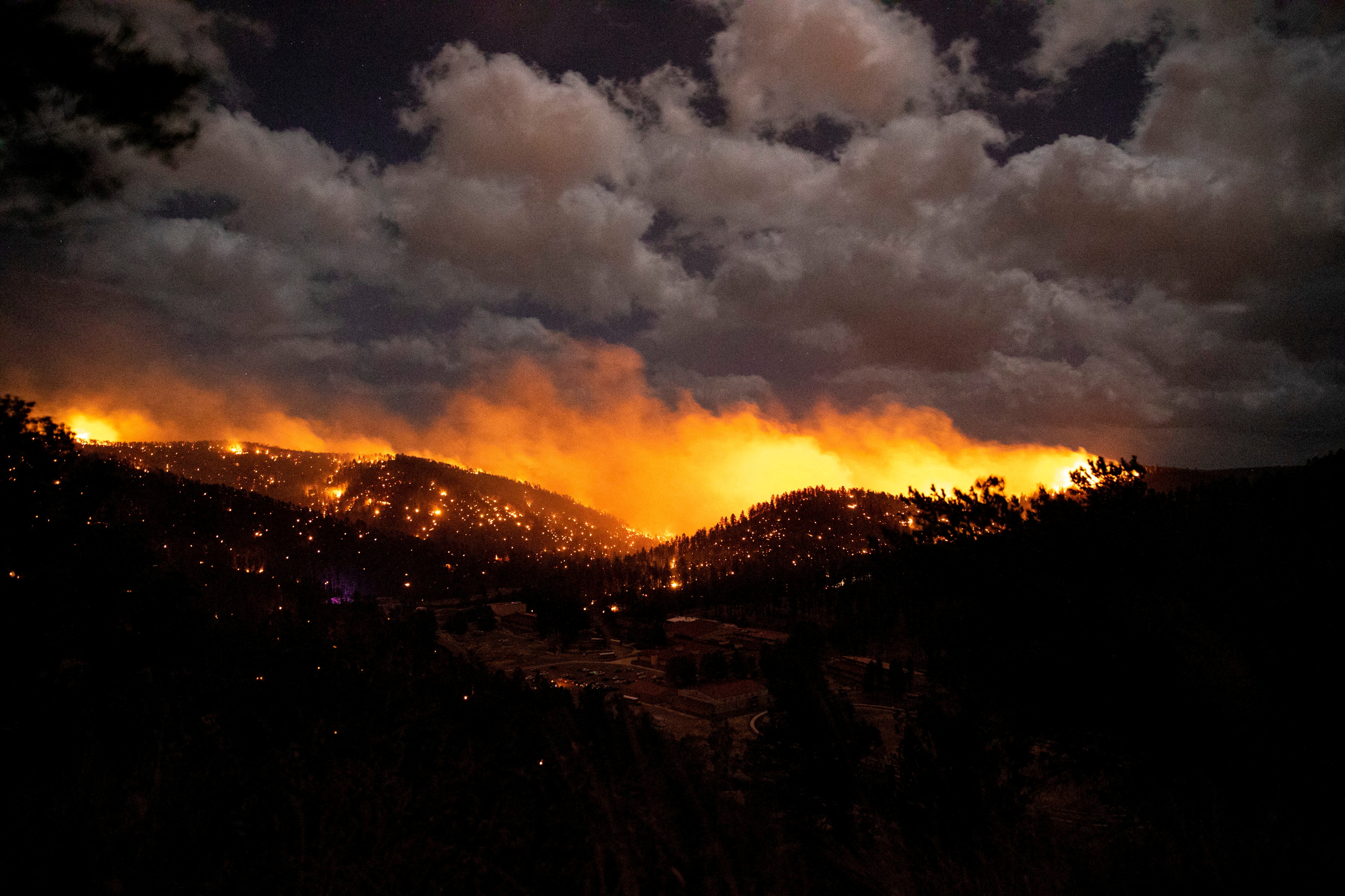 FILE PHOTO: The McBride Fire burns in the heart of the village in Ruidoso