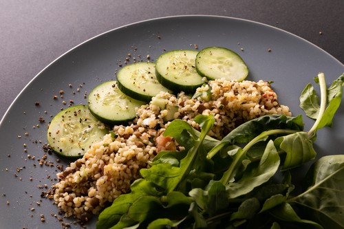 Close-up of healthy food in plate on table, copy space
