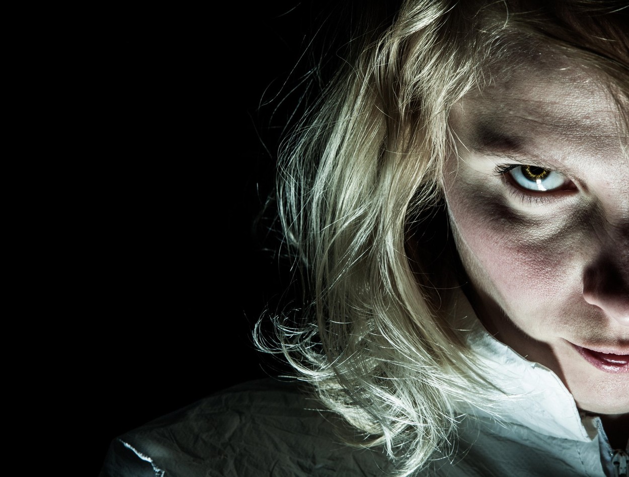 Scary Psycho Blonde Woman Looking at the Camera