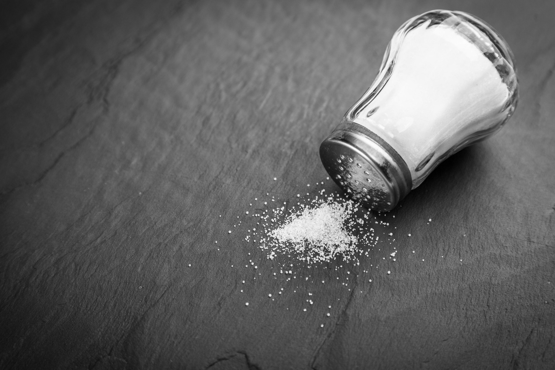 Salt shaker on slate board