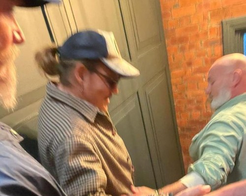 Johnny Depp gets handshakes from fans at UK pub moments before winning his defamation trial against Amber Heard