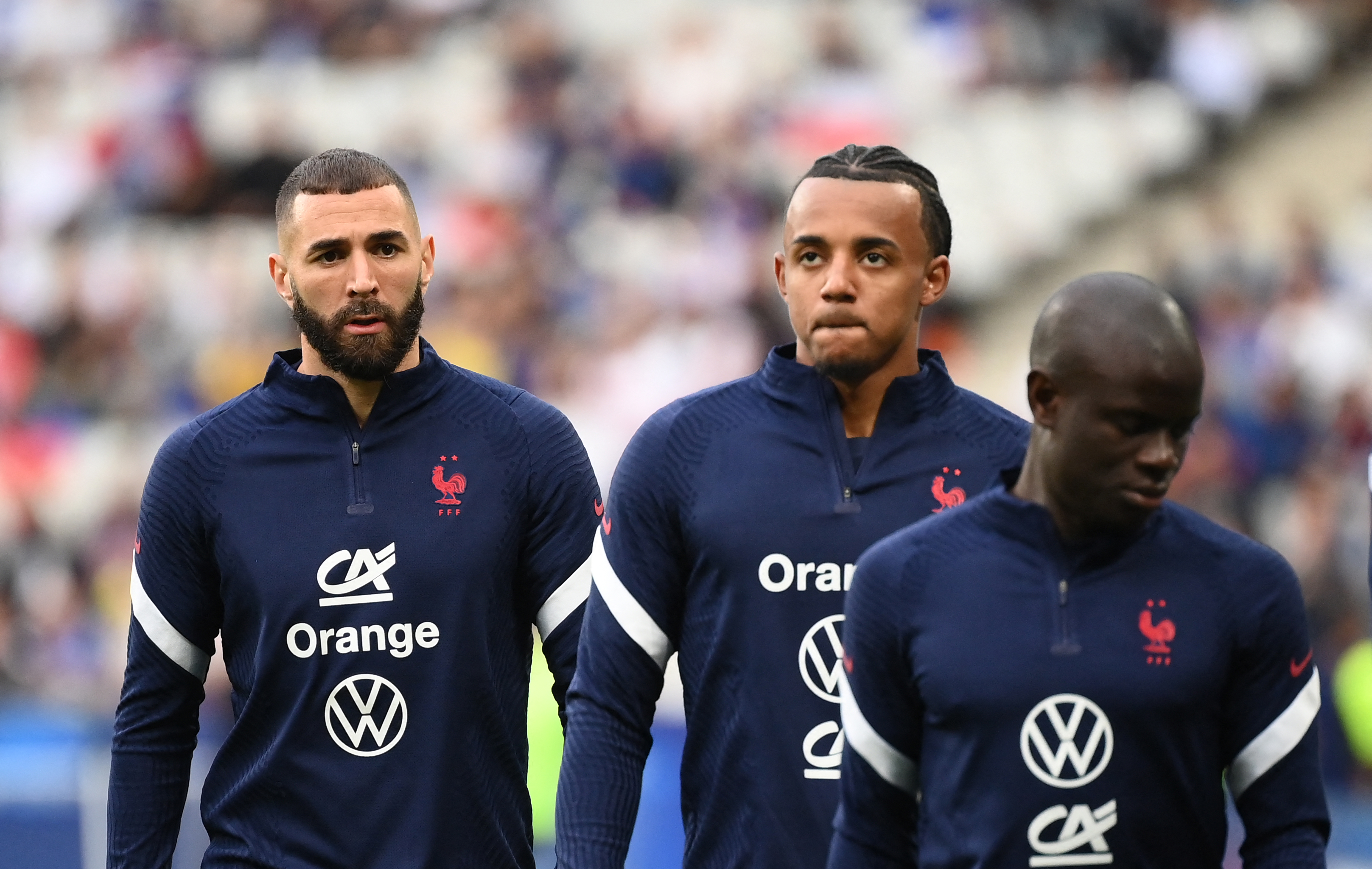 Karim Benzema (L), Jules Kounde (C) N'Golo Kante (R)