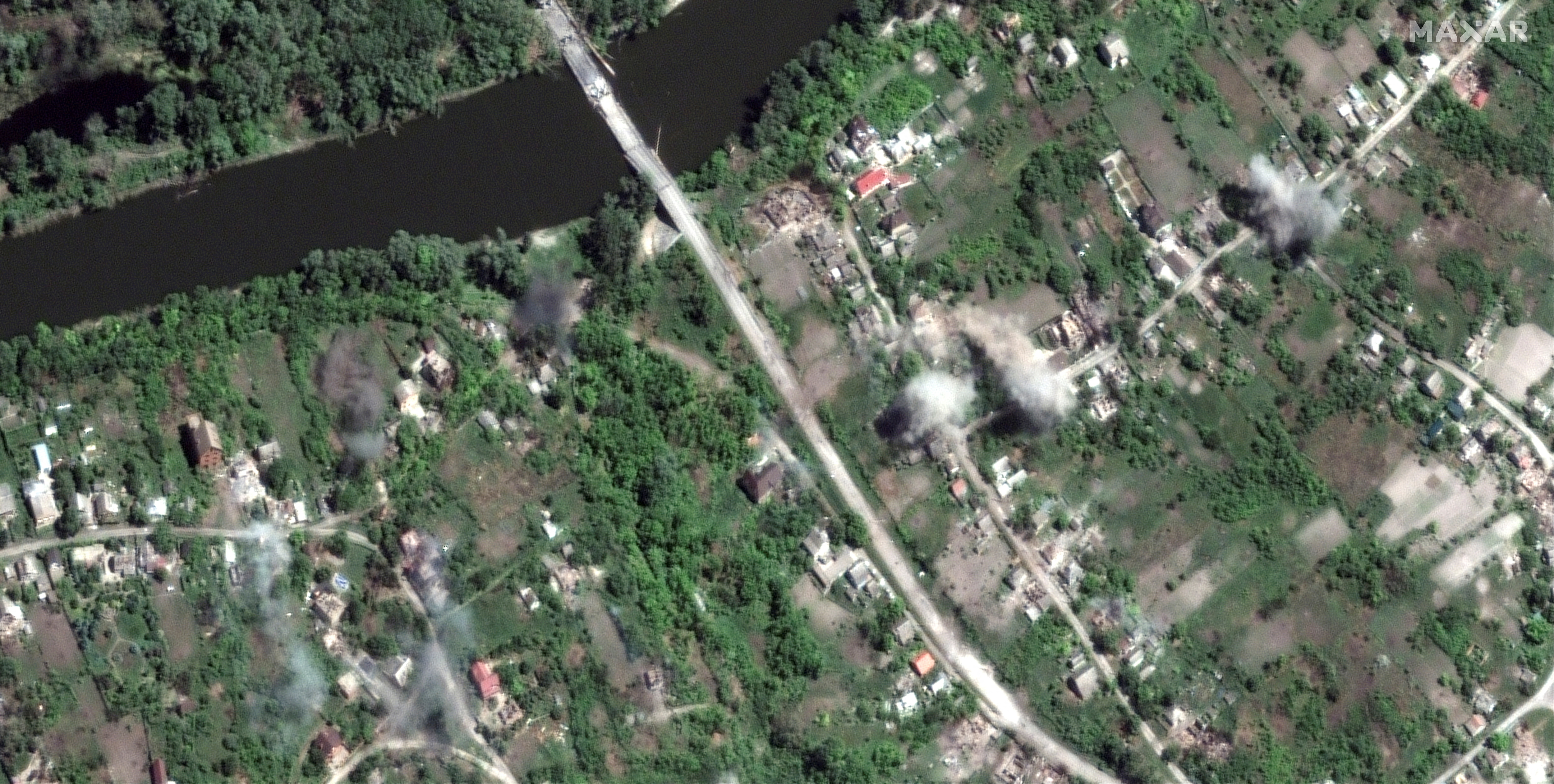 A satellite image shows artillery explosions along Siverskyi Donets River and town of Bogorodichne
