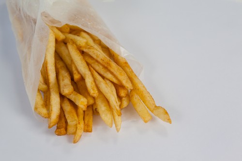 French fried chips on table