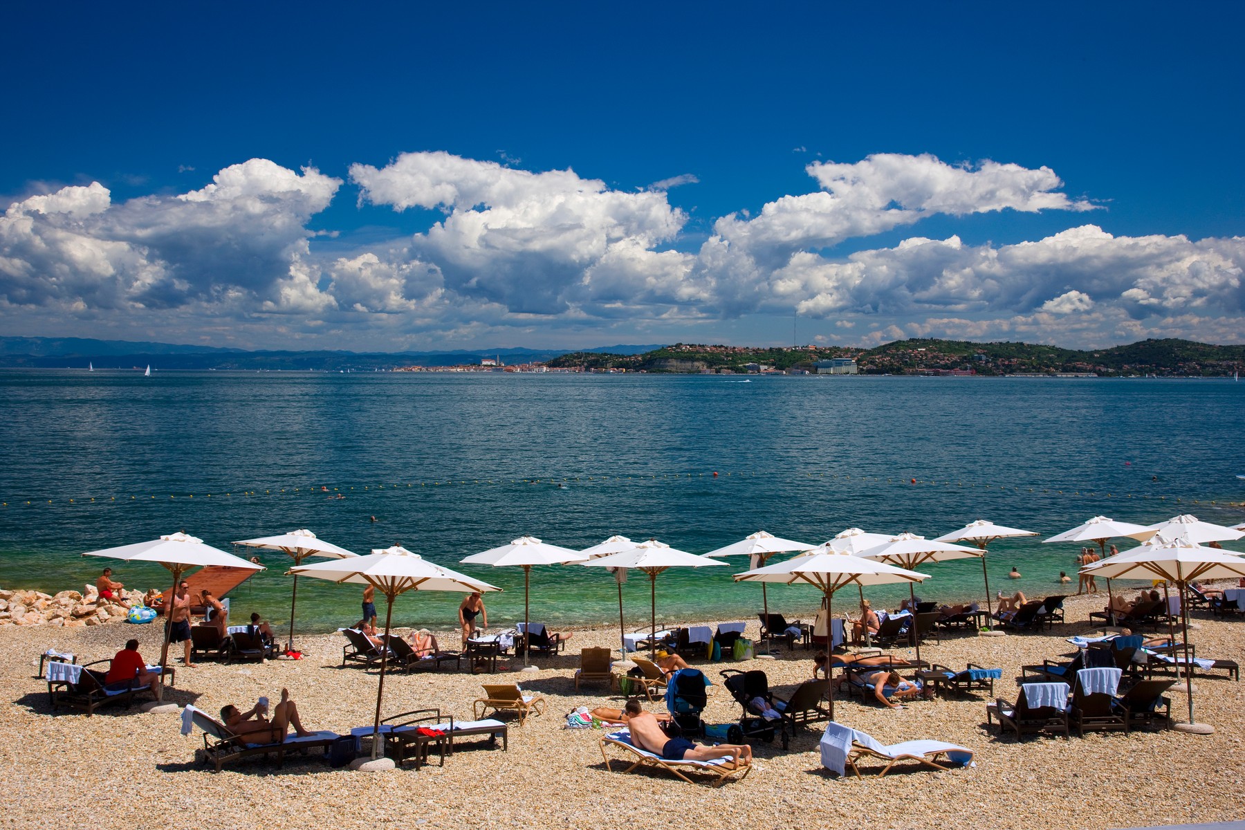 Beach at the Kempinski Hotel Adriatic in Savudrija Alberi with view towards Piran in Slovenia, Istrian Peninsula, Croatia