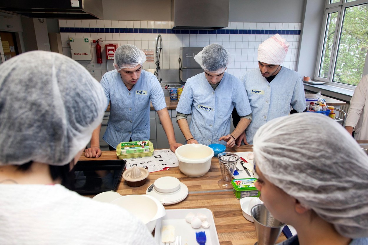 International school class learns how to cook and bake in the training kitchen.