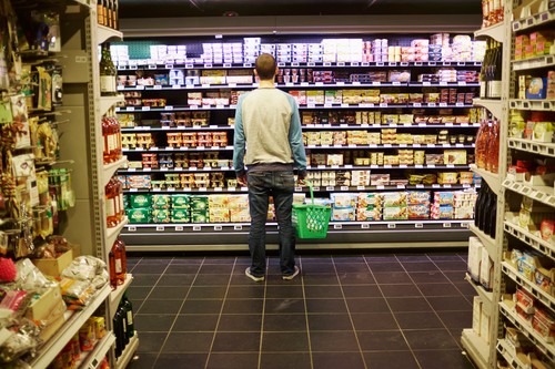 Man shopping in supermarket