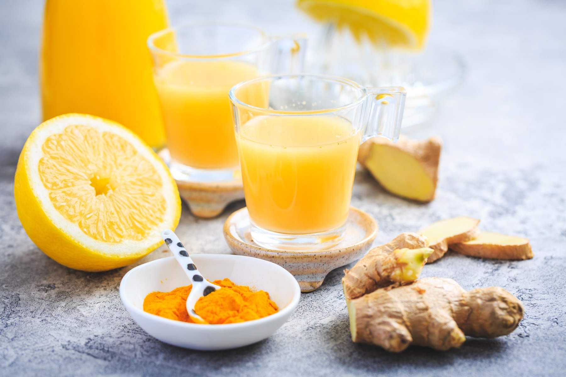 Close up of healthy Ginger Lemon Turmeric Shot  ideal to boost the immune system