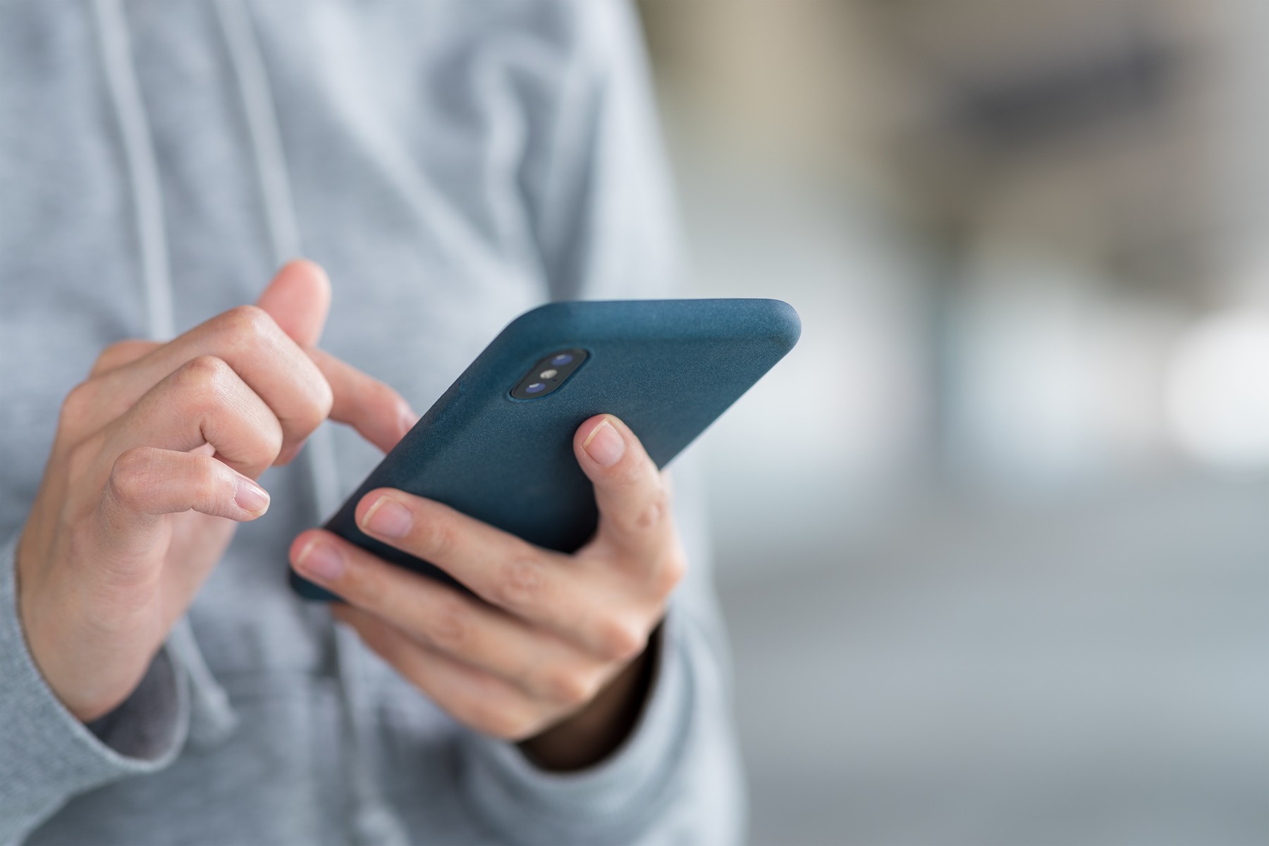 Woman use of mobile phone at outdoor