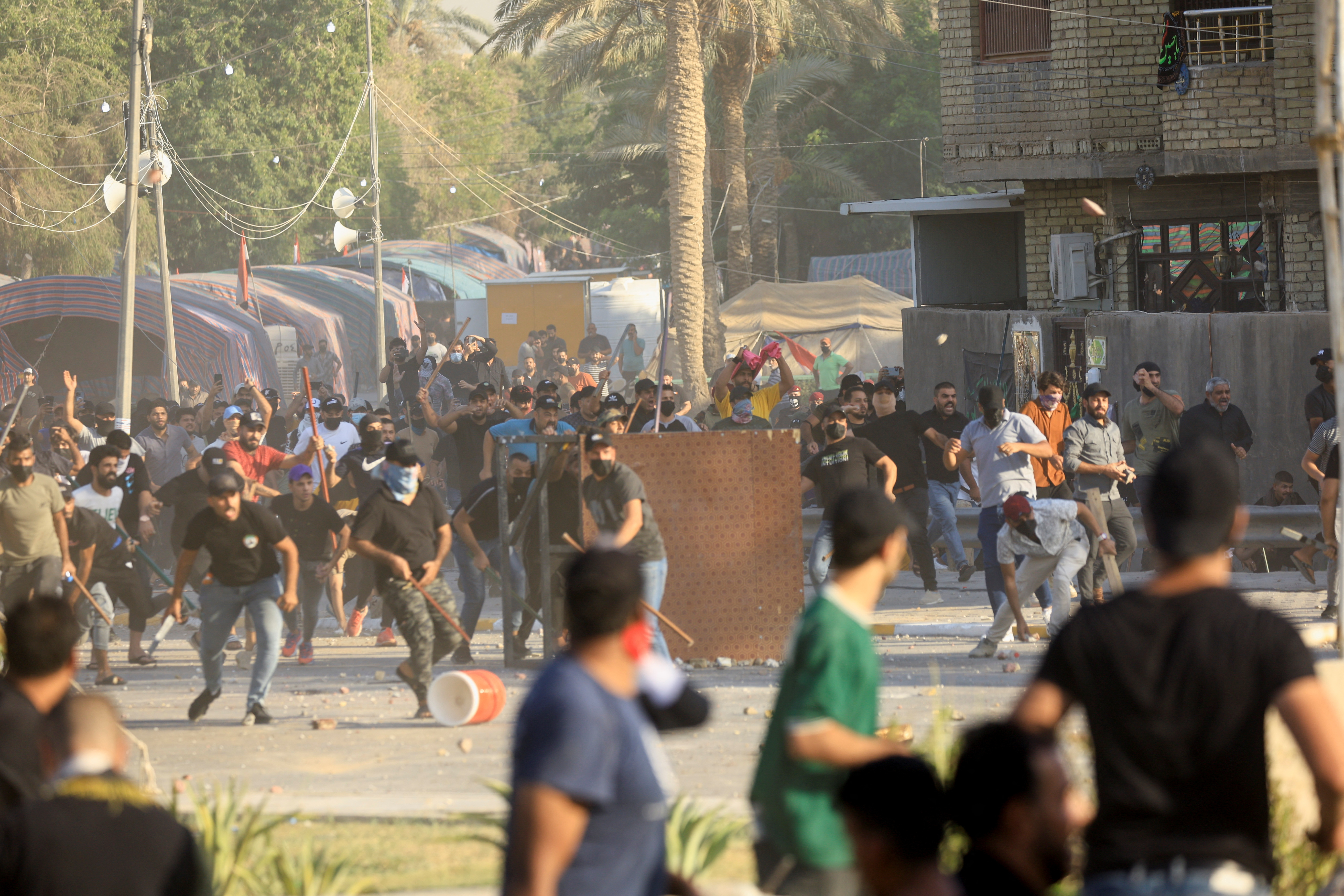Supporters of Iraqi populist leader Moqtada al-Sadr protest inside the Green Zone, in Baghdad