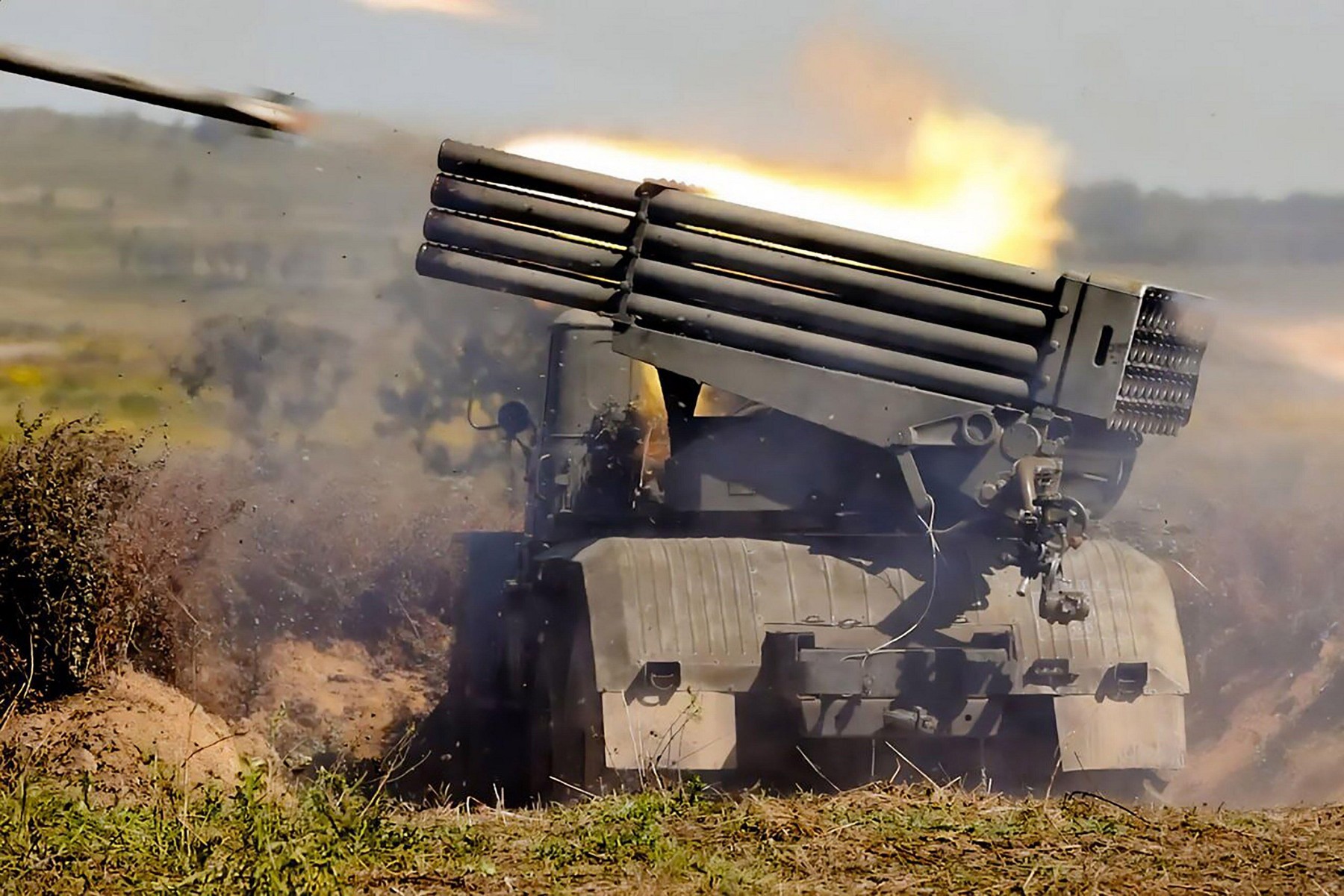 Russian self-propelled multiple rocket launchers fire projectiles during the 'Vostok-2022' military exercises at the Sergeevskyi training ground outside the city of Ussuriysk on the Russian Far East, on Tuesday on September 6, 2022. The Vostok 2022 milita